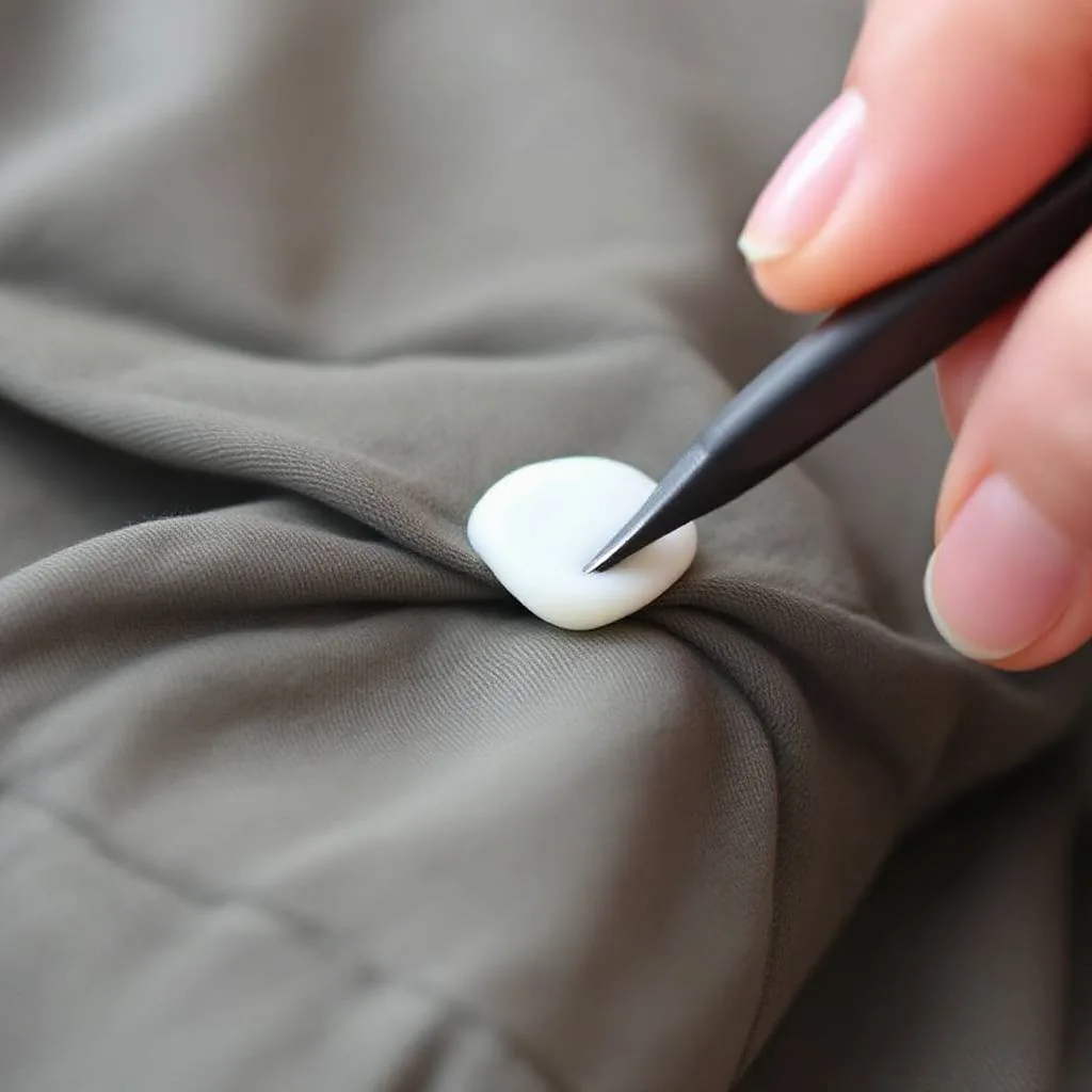 Enlever du chewing-gum sur un vêtement